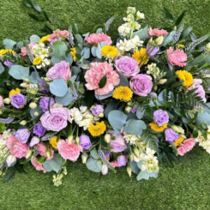 Lilac and pink coffin spray, a handcrafted funeral & sympathy by Flowers by Kerry Mac Manchester florist