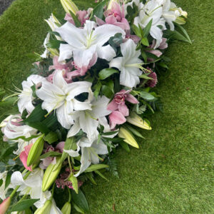 Lily & Orchid Casket spray, a handcrafted funeral & sympathy by Flowers by Kerry Mac Manchester florist