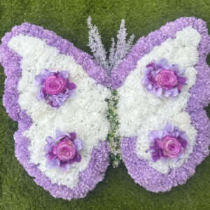 Butterfly Funeral Tribute Artificial, a handcrafted funeral flowers by Flowers by Kerry Mac Manchester florist