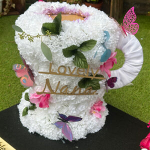 Tea cup funeral tribute, a handcrafted funeral flowers by Flowers by Kerry Mac Manchester florist