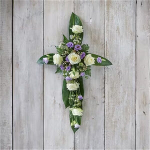 Lilac and white cross, a handcrafted funeral flowers by Flowers by Kerry Mac Manchester florist