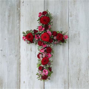 Red and pink cross, a handcrafted funeral flowers by Flowers by Kerry Mac Manchester florist