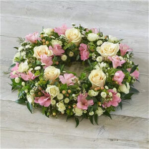 Soft pastel wreath, a handcrafted funeral flowers by Flowers by Kerry Mac Manchester florist
