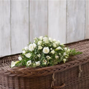 Petite casket spray, a handcrafted funeral flowers by Flowers by Kerry Mac Manchester florist