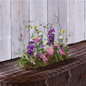 Pink Linear tribute, a handcrafted funeral flowers by Flowers by Kerry Mac Manchester florist
