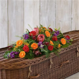 Tropical Casket Spray, a handcrafted funeral flowers by Flowers by Kerry Mac Manchester florist