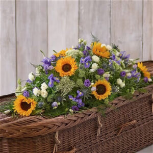 Sunflower Mix Casket spray, a handcrafted funeral flowers by Flowers by Kerry Mac Manchester florist