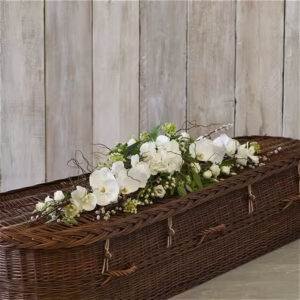 White and green eco-friendly casket tribute, a handcrafted funeral flowers by Flowers by Kerry Mac Manchester florist