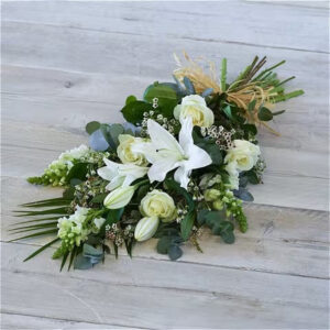 Pure white sheaf, a handcrafted funeral flowers by Flowers by Kerry Mac Manchester florist