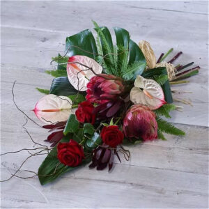 Tropical Sheaf, a handcrafted funeral flowers by Flowers by Kerry Mac Manchester florist