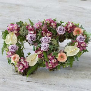 Deluxe Double Heart, a handcrafted funeral flowers by Flowers by Kerry Mac Manchester florist
