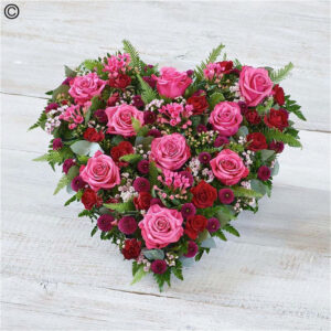 Cerise Rose Heart, a handcrafted funeral flowers by Flowers by Kerry Mac Manchester florist