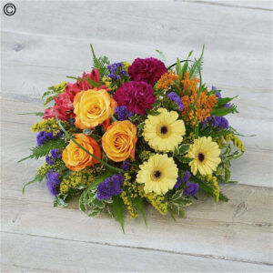 Brights Bold Posy, a handcrafted funeral flowers by Flowers by Kerry Mac Manchester florist
